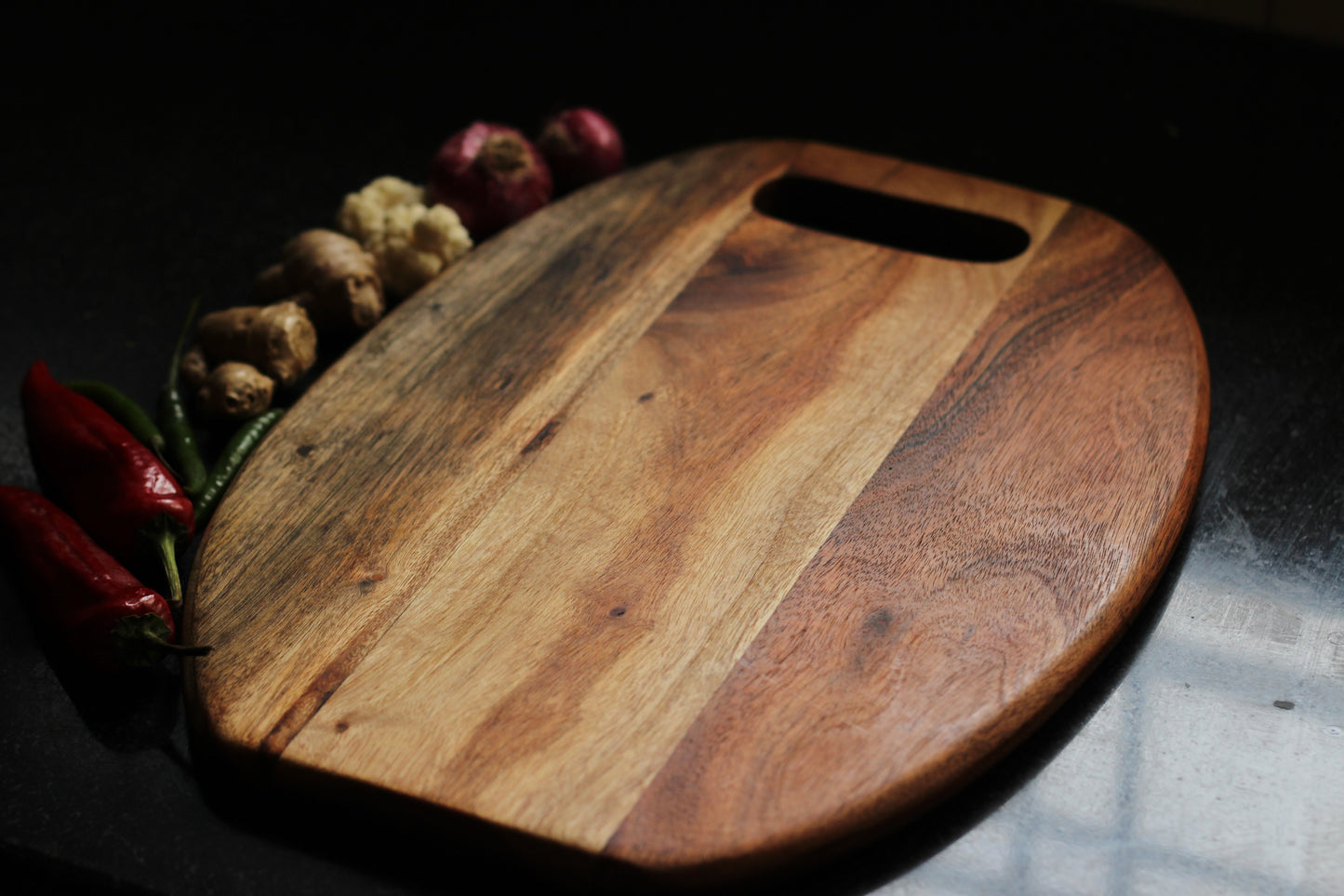 Close-up of the anti-bacterial acacia surface, showing natural wood grain and smooth finish.