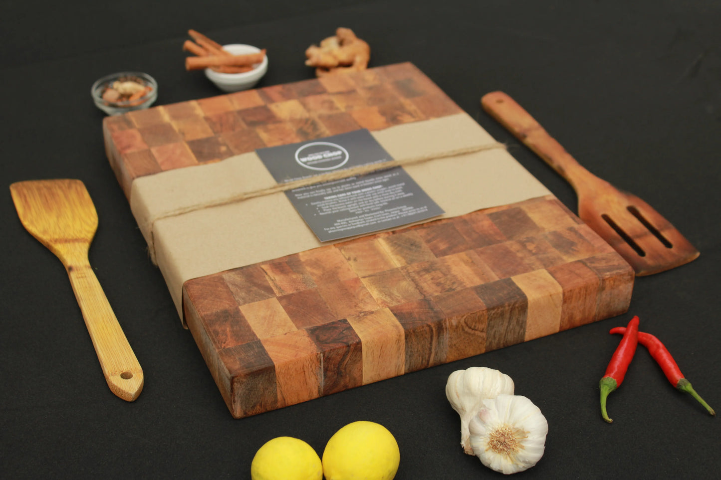 Close-up of the end grain texture with visible natural mango wood tones.