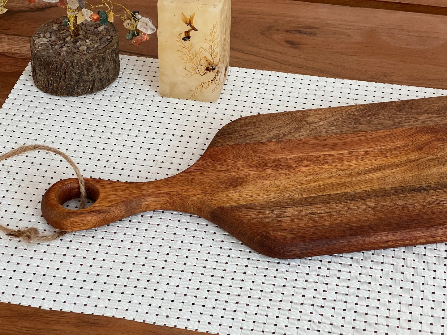 Side angle showing the board's slim 0.5-inch profile and long rectangular shape.