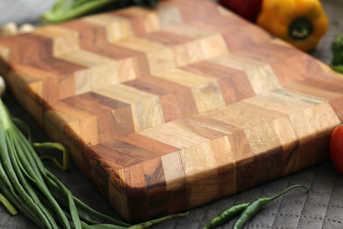 Close-up of the intricate end grain wood pattern showcasing high craftsmanship and contrasting wood tones.