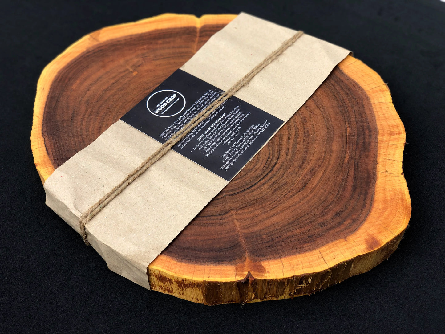 Side profile showing 1.25-inch thickness and raw tree bark edge for a rustic look.