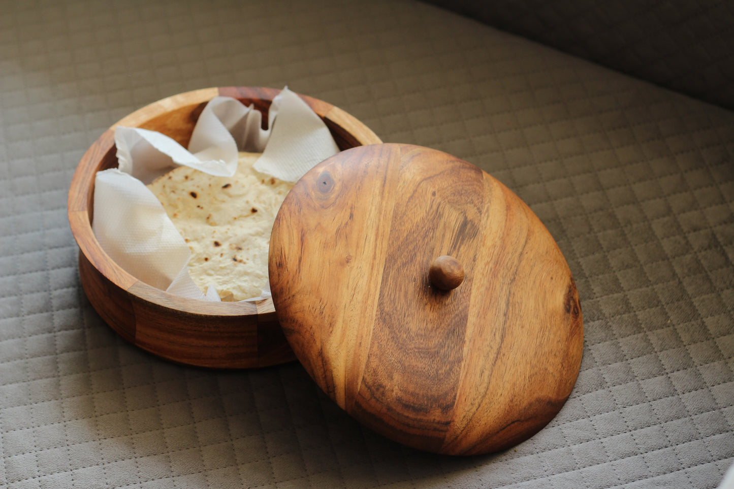 Acacia casserole styled with kitchen accessories, perfect for rustic and modern kitchen décor.