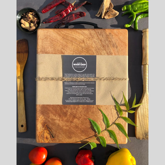 Top view of a single-piece mango wood cutting board with natural wood texture.