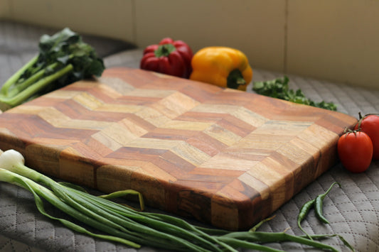 Top view of the 3D pattern cutting board made from mango and acacia wood with a stunning cube illusion.