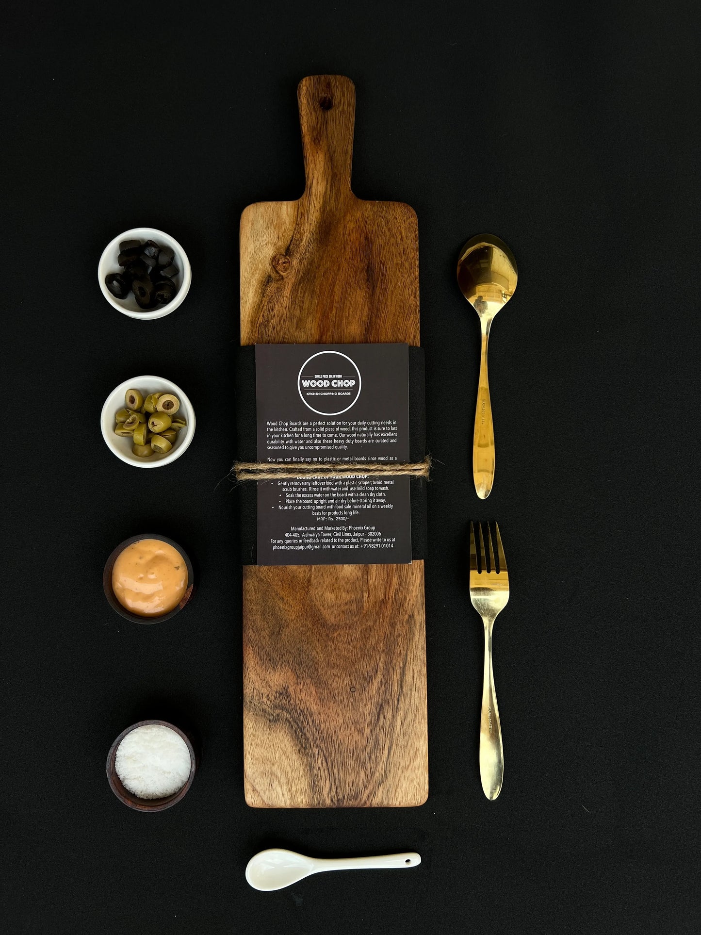 Top view of a slim 17x5 inch acacia cheese board with natural wood finish.