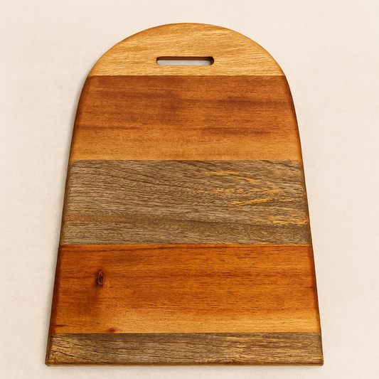Wooden cutting board with a handle on a beige background