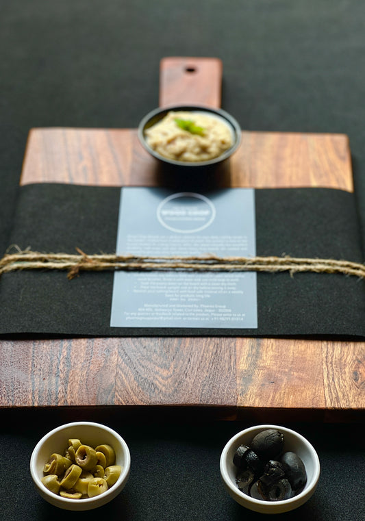 Top view of European-style acacia wood board with antique shape, ideal for cutting or serving cheese and charcuterie.