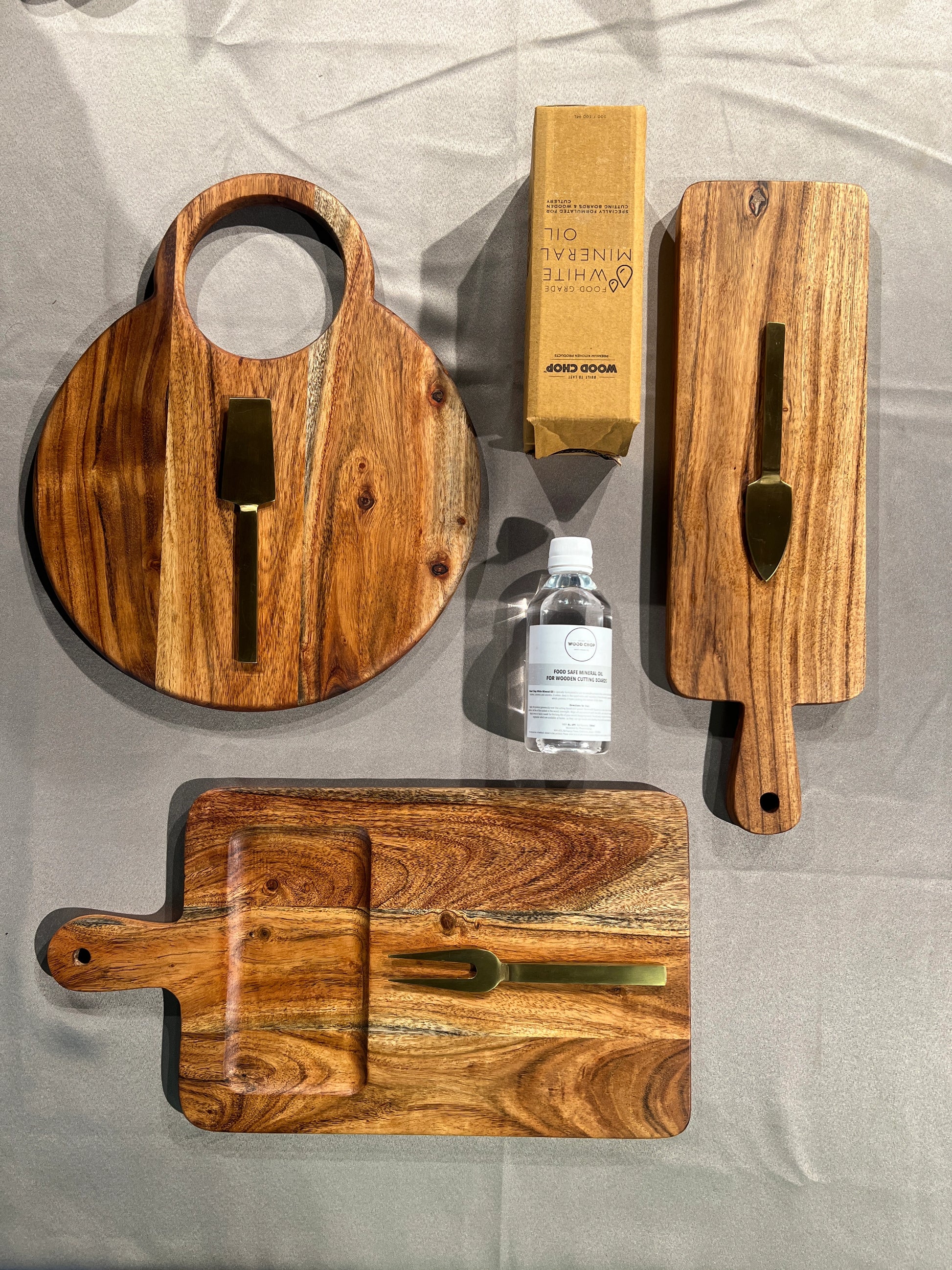 Close-up of the grain and finish on one of the acacia wooden pieces included in the Cozy Gift Set.