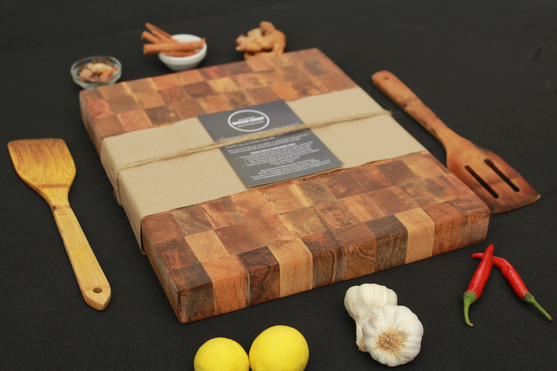 Close-up of the end grain texture with visible natural mango wood tones.

