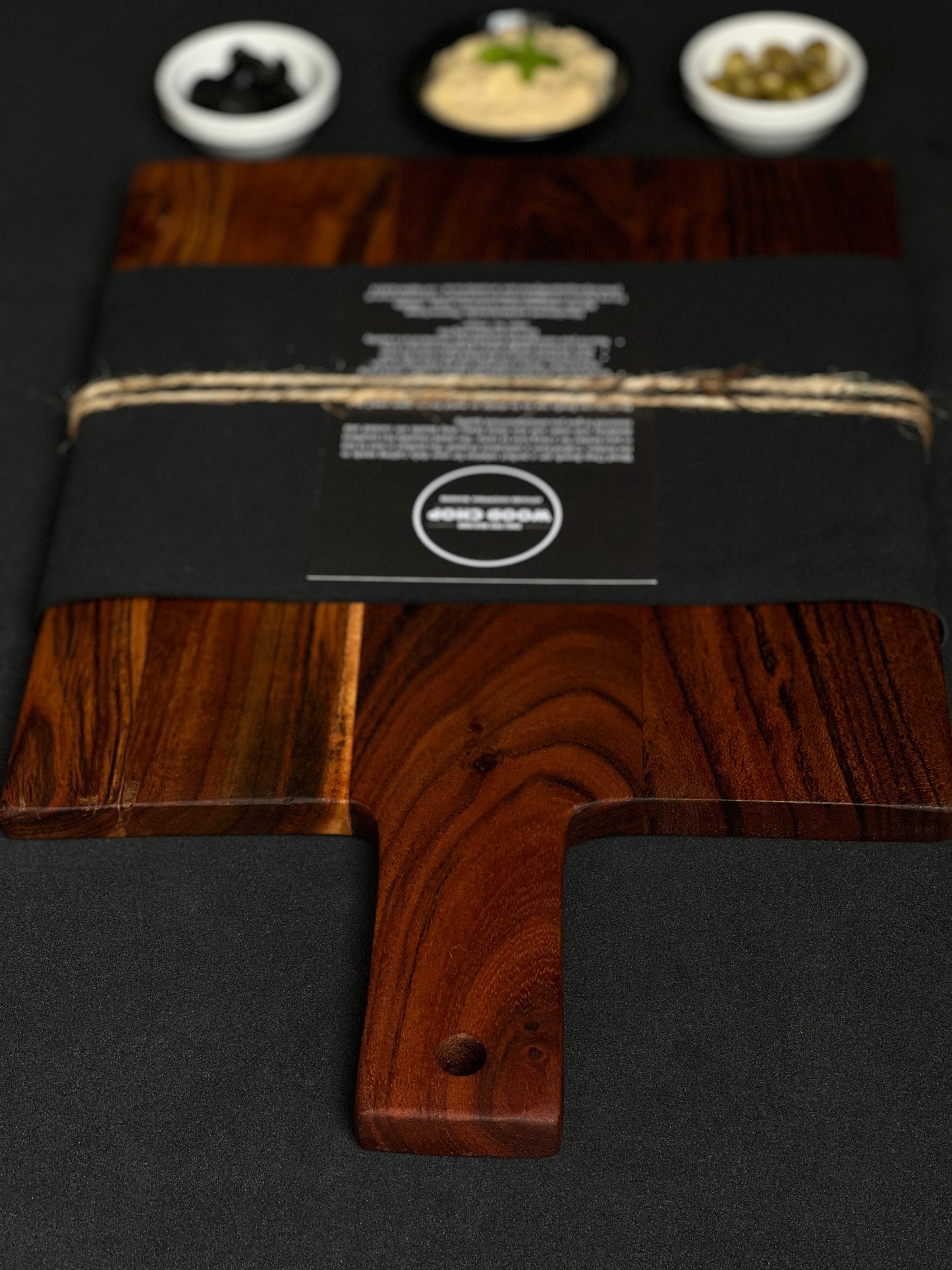  Reversible board shown from both sides, highlighting its versatility for cutting and serving.