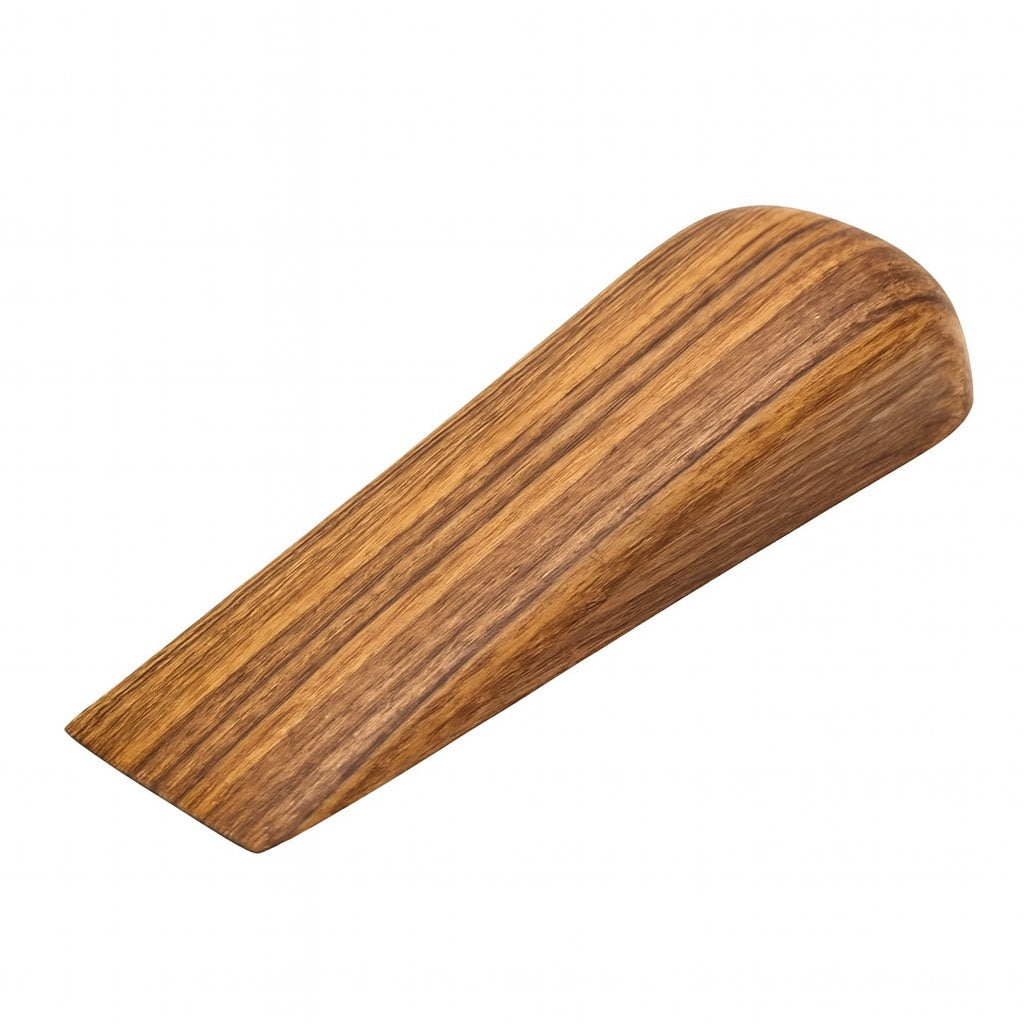 Wooden door stopper on a white background